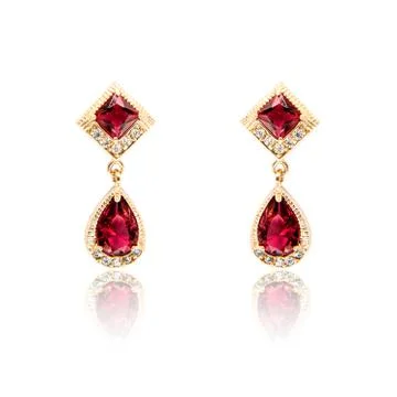 Pair of ruby diamond earrings isolated on white Stock Photos