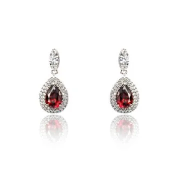 Pair of ruby diamond earrings isolated on white Foto stock