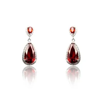 Pair of ruby diamond earrings isolated on white Stock Photos