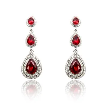 Pair of ruby diamond earrings isolated on white Stock Photos