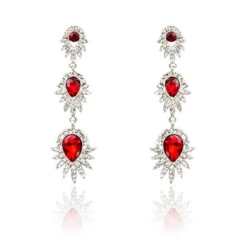 Pair of ruby diamond earrings isolated on white Stock Photos