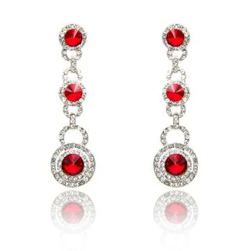 Pair of ruby diamond earrings isolated on white Stock Photos