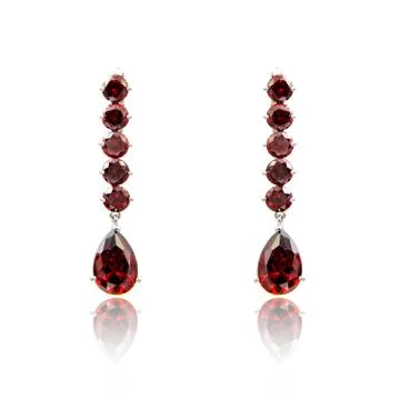 Pair of ruby diamond earrings isolated on white Stock Photos
