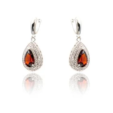 Pair of ruby diamond earrings isolated on white Stock Photos