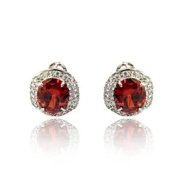 Pair of ruby diamond earrings isolated on white Stock Photos