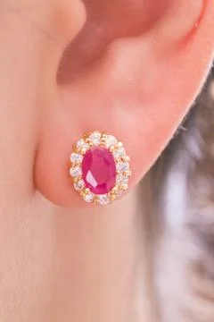 Pair of ruby diamond earrings the on white background. 写真素材