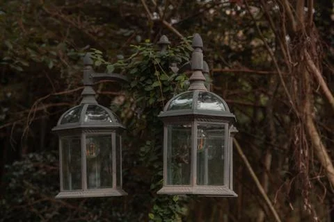 A pair of rustic old lamps Stock Photos