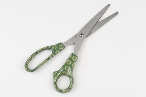 A pair of scissors with decorated handles Stock Photos