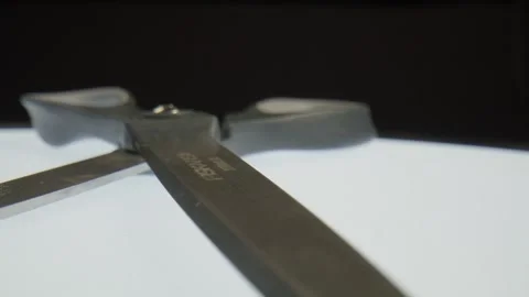 Pair of scissors open and close up. Vídeos de archivo 304029885
