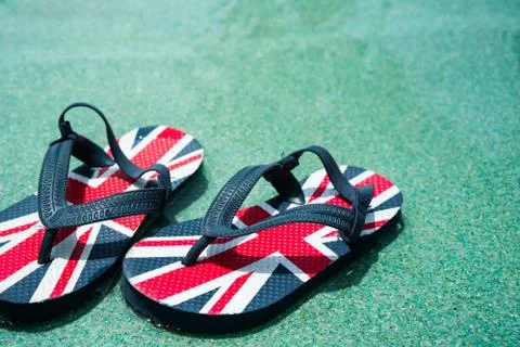 A Pair of Slippers in Pool Side Stock Photos