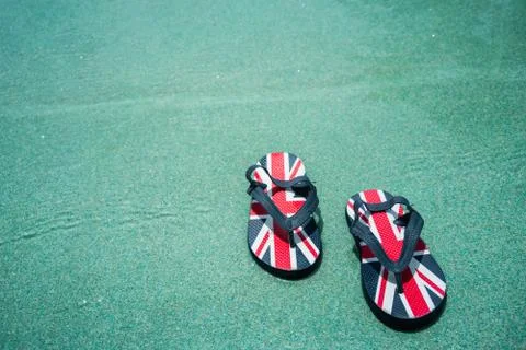 A Pair of Slippers in Pool Side Stock Photos