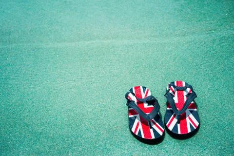 A Pair of Slippers in Pool Side Stock Photos
