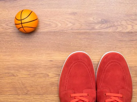 Pair of sneakers and basket ball Stock Photos