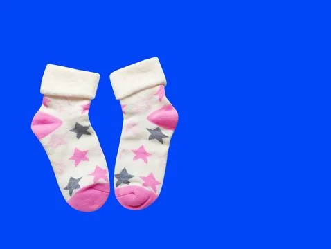 A pair of soft children's socks with a vibrant print. Photos