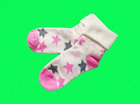A pair of soft children's socks with a vibrant print. Stock Photos