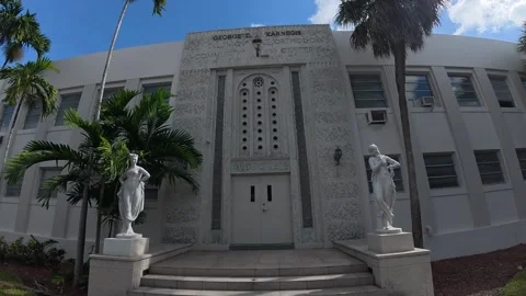 Pair of stone saint statues flanking historic church entrance Stock Footage 320213872