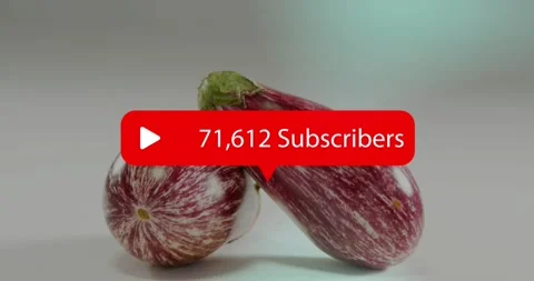 Pair of striped eggplants on table, red play badge appearing above and raising Stock Footage 331634758
