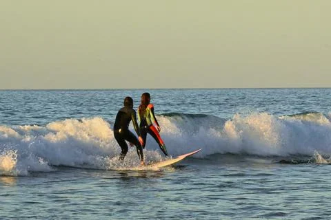 A pair of surfers conquer the Atlantic waves near Ferrol, Spain (2),25/08/2025 Stock Photos