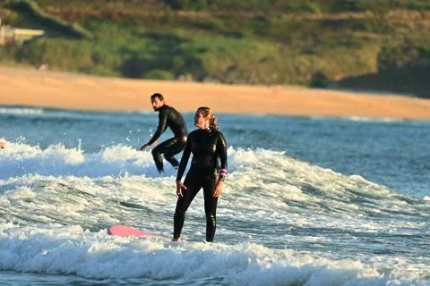 A pair of surfers conquer the Atlantic waves near Ferrol, Spain (10), 25/08/2025 Stock Photos