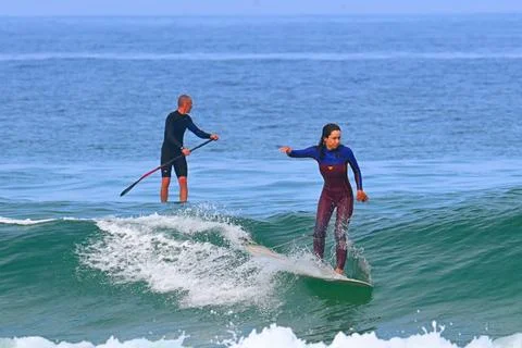 A pair of surfers conquer the Atlantic waves near Ferrol, Spain (3), 25/08/2025 Stock Photos