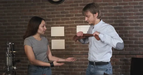 Pair of Tannery Masters are fooling around in their own Workshop. Drag Leather Stock Footage 132979088