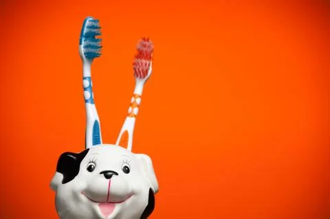 Pair of toothbrushes Stock Photos