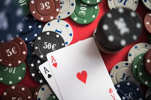 A pair of two aces with poker chips Stock Photos