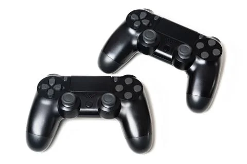 Pair of two black video game controllers Stock Photos