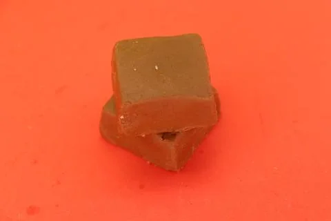 A pair of two chocolate one on one Stock Photos