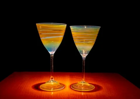 Pair of unique hand made carnival glass goblets Stock Photos