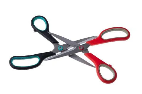 A pair of used scissors on white background Stock Photos