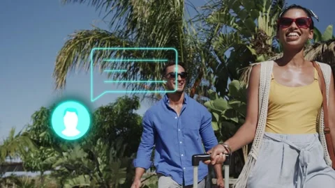 Pair walking palm path pulling bags while new alert animating chat bubble near Stock Footage 333720267