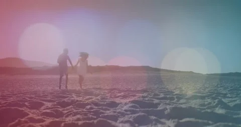 Pair walking running toward lens as frames advancing pastel flare lighting pair Video stock 331084664