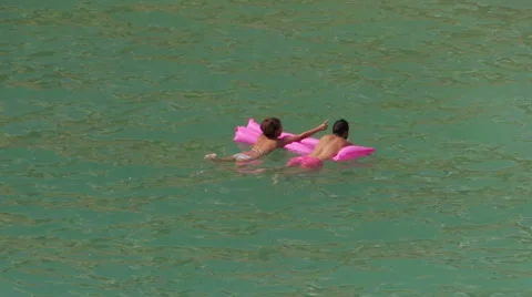 Pair while bathing in the sea Stock Footage 32595924