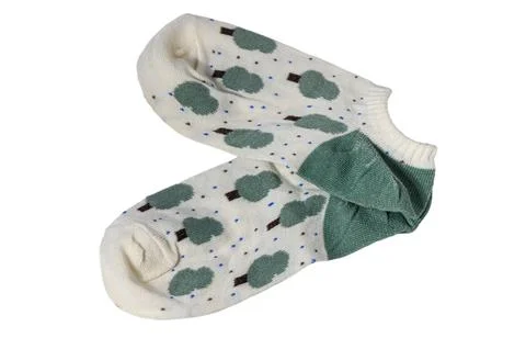 Pair of white ankle socks with green tree pattern and green heels isolated .. Stock Photos