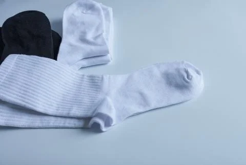 A pair of white socks on a white background. Casual wear. Stock Photos