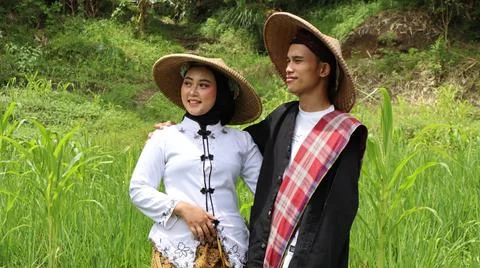 A pair of young farmers Stock Photos