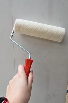 Pait roller brush on gray background Stock Photos