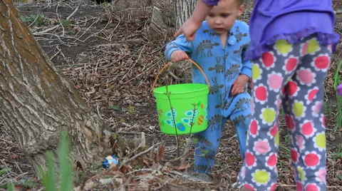 Pajama wearing easter egg hunters. Stock Footage 37759843