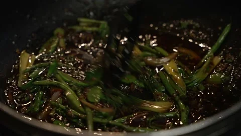 Pak Choi And Chilli Paste Being Stirred In Oil Inside Wok. Slow Motion, Stock Footage 220272630