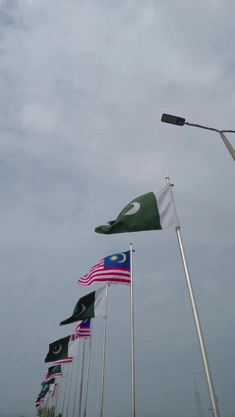 Pakistan and Malaysia Flags Stock Footage 342931838