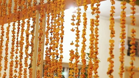 Pakistani and Indian Wedding Decor with Orange Marigold Genda Phool Toran and Fl 스톡 동영상 343620066