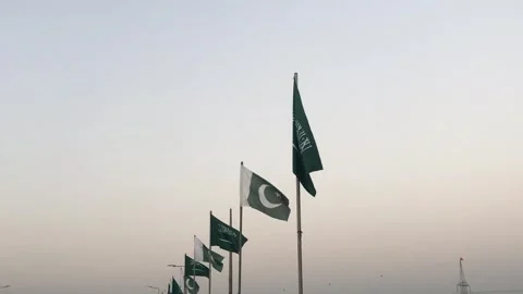 Pakistani and Saudi National Flags Displayed Side by Side in Unity Stockbeeldmateriaal 344650686