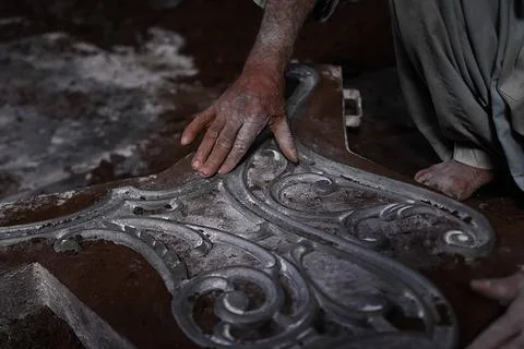 Pakistani workers at an iron die-casting factory in Karachi, Pakistan - 10 Sep 2 Stock Photos
