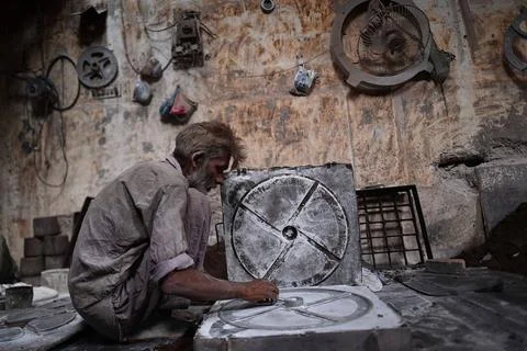Pakistani workers at an iron die-casting factory in Karachi, Pakistan - 10 Sep 2 Stock Photos