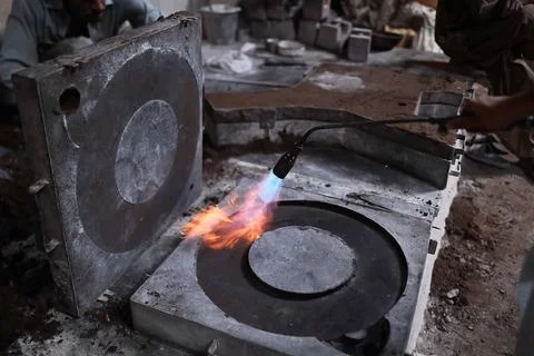 Pakistani workers at an iron die-casting factory in Karachi, Pakistan - 10 Sep 2 Stock Photos