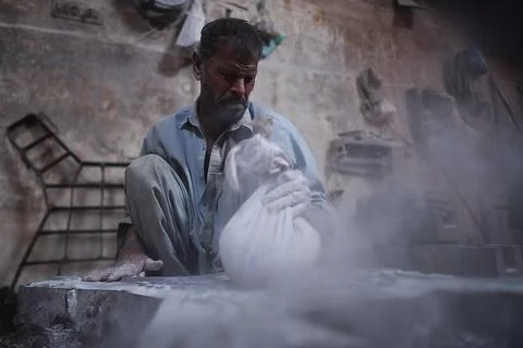 Pakistani workers at an iron die-casting factory in Karachi, Pakistan - 10 Sep 2 Stock Photos