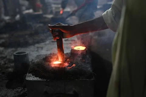 Pakistani workers at an iron die-casting factory in Karachi, Pakistan - 10 Sep 2 Stock Photos