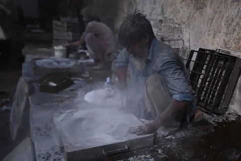 Pakistani workers at an iron die-casting factory in Karachi, Pakistan - 10 Sep 2 Stock Photos