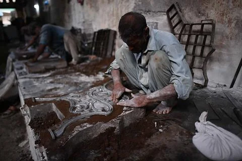 Pakistani workers at an iron die-casting factory in Karachi, Pakistan - 10 Sep 2 Stock Photos